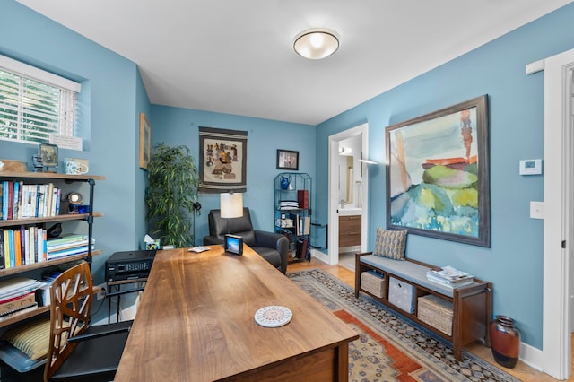 233 S Ohio Ave Unit 11, Columbus, OH 43205 - home office with baseboards and wood finished floors