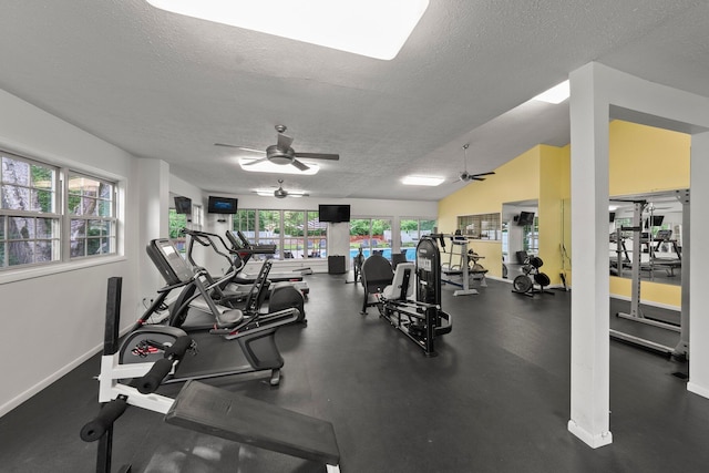 2560 Scioto View Ln, Columbus, OH 43221 - gym featuring a textured ceiling, healthy amount of natural light, ceiling fan, and baseboards