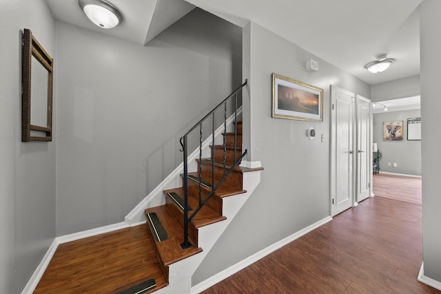 2560 Scioto View Ln, Columbus, OH 43221 - stairs with wood finished floors and baseboards