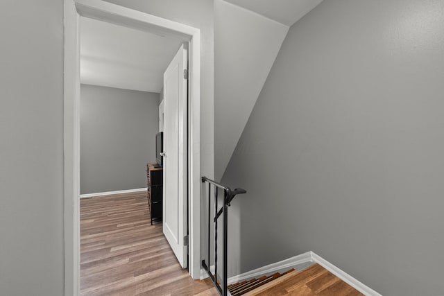 2560 Scioto View Ln, Columbus, OH 43221 - stairway featuring wood finished floors, baseboards, and lofted ceiling