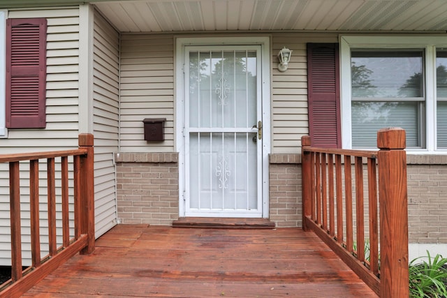 6451 Faircrest Rd, Columbus, OH 43229 - doorway to property with brick siding and covered porch