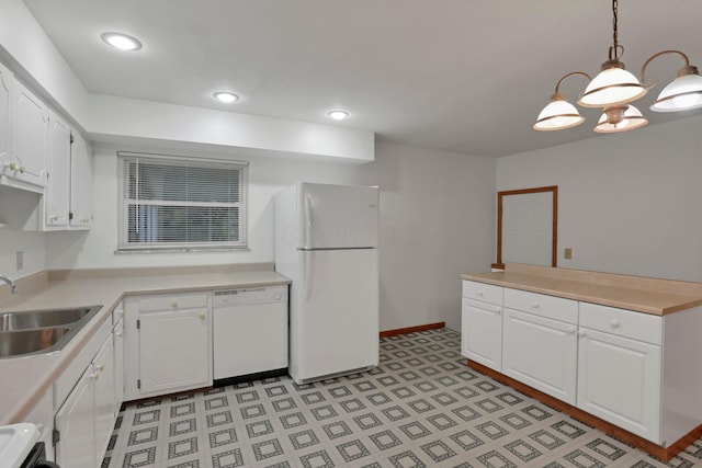 6451 Faircrest Rd, Columbus, OH 43229 - kitchen featuring white appliances, a sink, white cabinetry, light countertops, and recessed lighting
