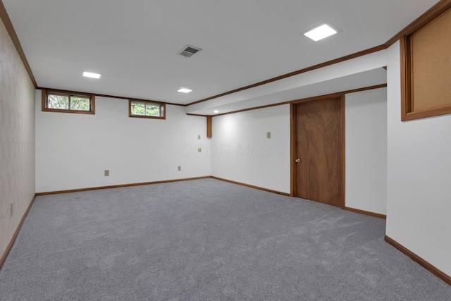 6451 Faircrest Rd, Columbus, OH 43229 - below grade area featuring carpet flooring, baseboards, crown molding, and recessed lighting
