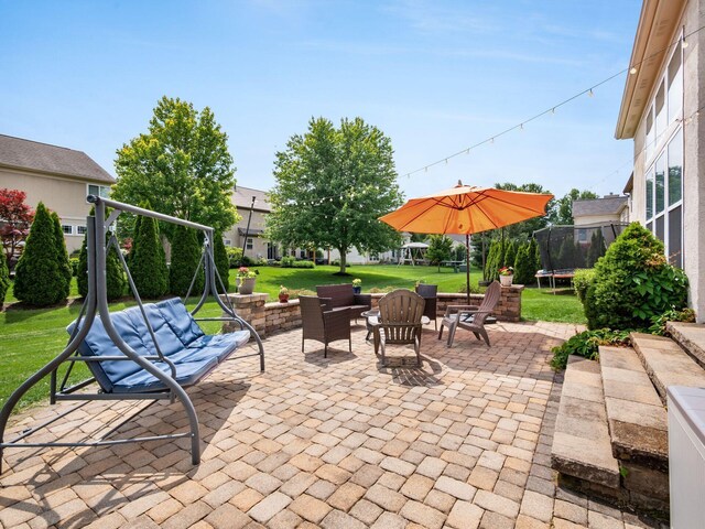 7915 Fargo Ln, Delaware, OH 43015 - view of patio with a trampoline and a playground
