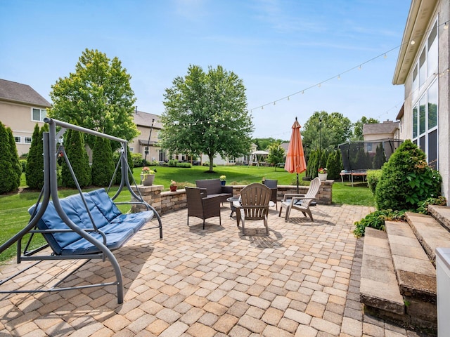 7915 Fargo Ln, Delaware, OH 43015 - view of patio featuring a trampoline and a playground