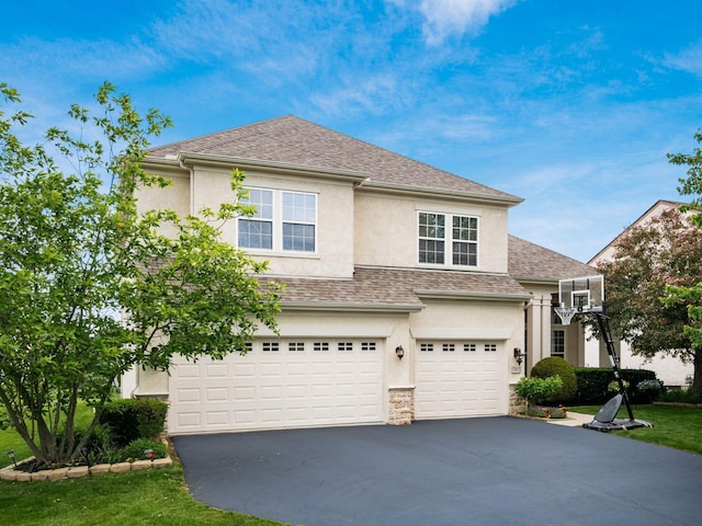 7915 Fargo Ln, Delaware, OH 43015 - traditional-style home featuring stucco siding, a garage, asphalt driveway, and roof with shingles
