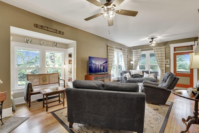 1350 Lancaster Kirkersville Rd NW, Lancaster, OH 43130 - living room with ceiling fan, light wood-style floors, and baseboards