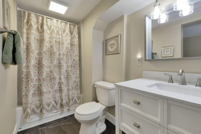 1350 Lancaster Kirkersville Rd NW, Lancaster, OH 43130 - full bathroom featuring vanity, marble finish flooring, toilet, shower / bath combo, and baseboards