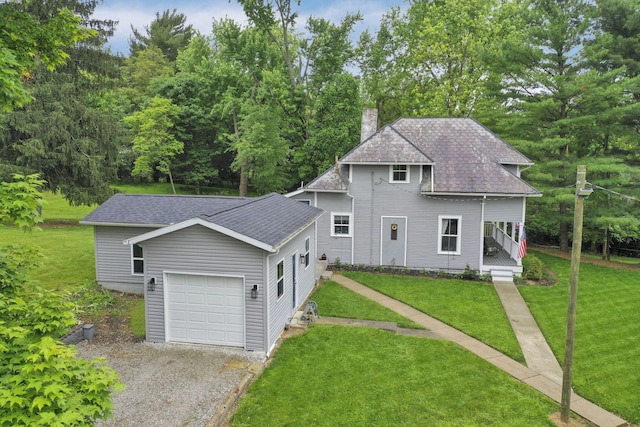 1350 Lancaster Kirkersville Rd NW, Lancaster, OH 43130 - view of front facade with a chimney, driveway, a garage, and a front yard