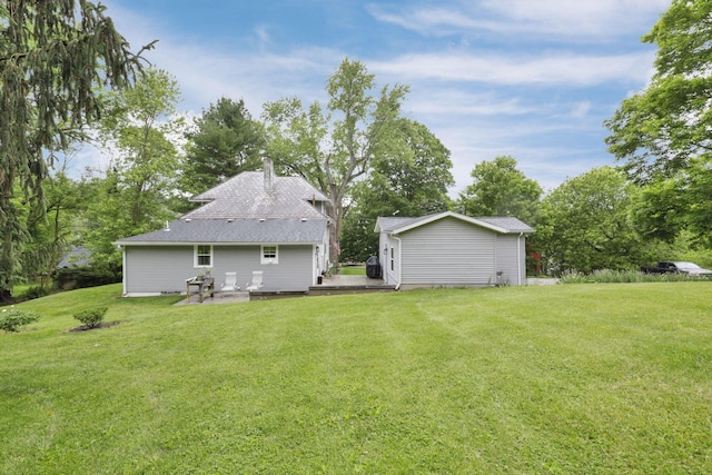 1350 Lancaster Kirkersville Rd NW, Lancaster, OH 43130 - back of property featuring a yard, a deck, and view of wooded area