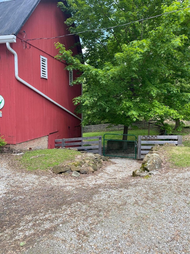 1350 Lancaster Kirkersville Rd NW, Lancaster, OH 43130 - view of side of property featuring a barn, an outbuilding, and a gate