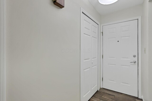384 Sandburr Dr, Columbus, OH 43230 - doorway to outside featuring dark wood-type flooring