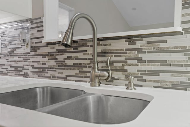 384 Sandburr Dr, Columbus, OH 43230 - kitchen view of a sink and decorative backsplash