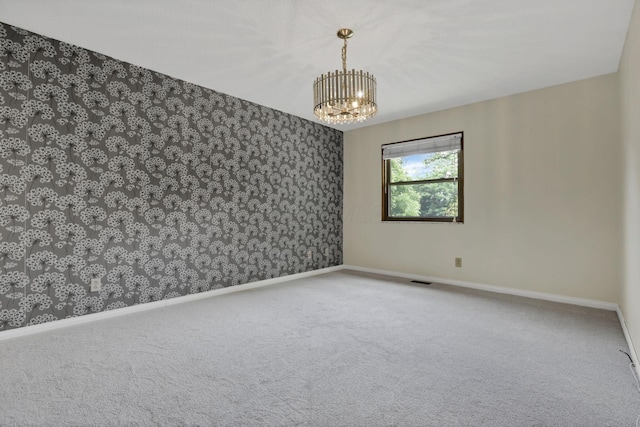 384 Sandburr Dr, Columbus, OH 43230 - carpeted spare room with a chandelier and wallpapered walls