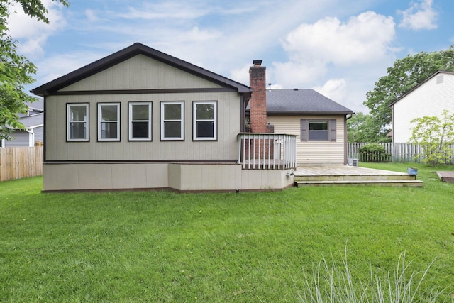 384 Sandburr Dr, Columbus, OH 43230 - rear view of property featuring a wooden deck and a chimney