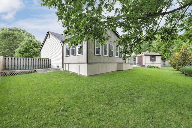 384 Sandburr Dr, Columbus, OH 43230 - view of green lawn with a shed