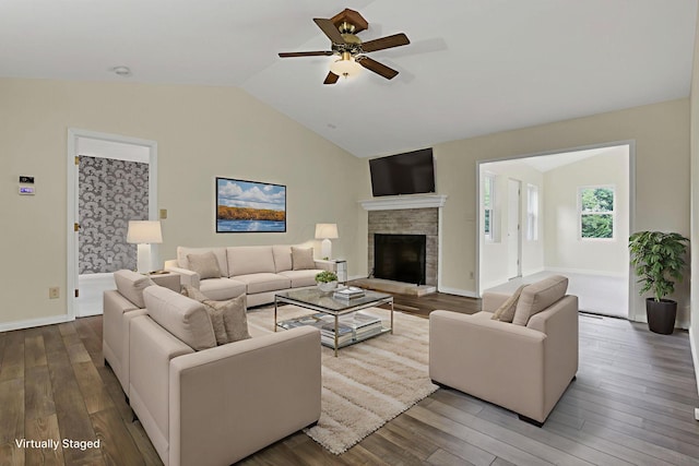 384 Sandburr Dr, Columbus, OH 43230 - living room featuring a ceiling fan, wood finished floors, vaulted ceiling, and a fireplace with raised hearth