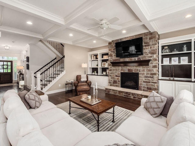 2462 Mccumber Ln, Lewis Center, OH 43035 - living room featuring wood finished floors, crown molding, beam ceiling, coffered ceiling, and a ceiling fan