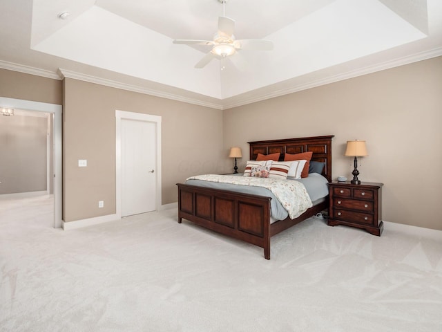 2462 Mccumber Ln, Lewis Center, OH 43035 - bedroom featuring light colored carpet, ornamental molding, a tray ceiling, and baseboards