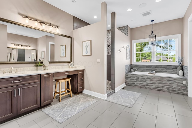 9568 Craigens Ct, Galena, OH 43021 - bathroom with vanity, a bath, a walk in shower, tile patterned flooring, and baseboards