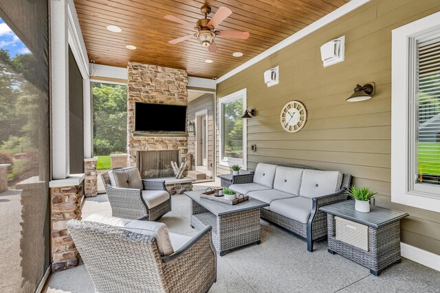 9568 Craigens Ct, Galena, OH 43021 - view of patio / terrace with an outdoor living space with a fireplace and ceiling fan