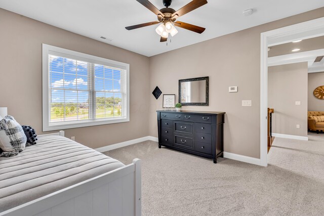 9568 Craigens Ct, Galena, OH 43021 - bedroom featuring baseboards, light colored carpet, and ceiling fan