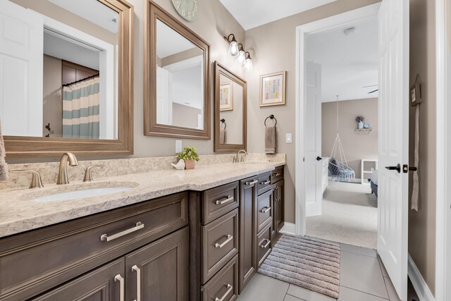9568 Craigens Ct, Galena, OH 43021 - bathroom featuring double vanity, tile patterned floors, and baseboards