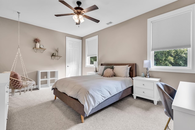9568 Craigens Ct, Galena, OH 43021 - bedroom featuring light carpet, multiple windows, and ceiling fan