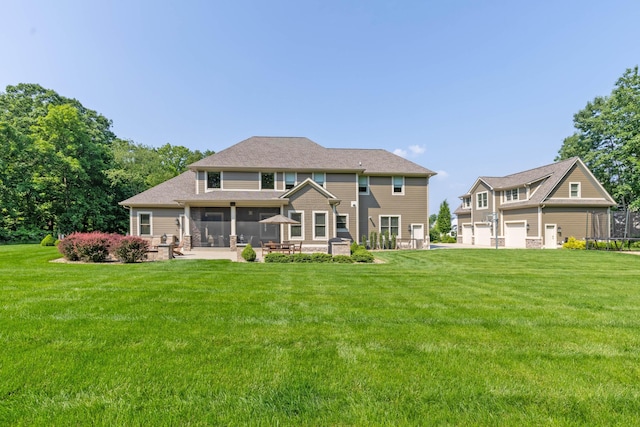 9568 Craigens Ct, Galena, OH 43021 - back of property with a sunroom, a lawn, and a patio area