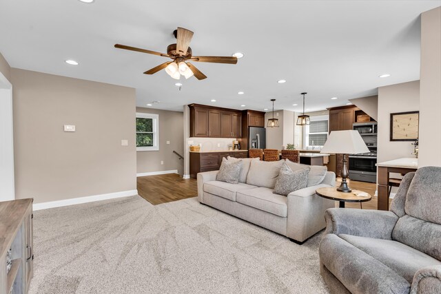 9568 Craigens Ct, Galena, OH 43021 - living area with light colored carpet, baseboards, a ceiling fan, and recessed lighting