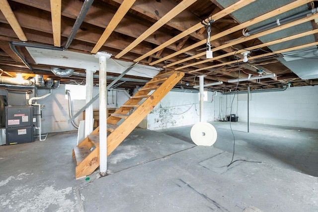 1936 Case Rd, Columbus, OH 43224 - basement with heating unit and stairway