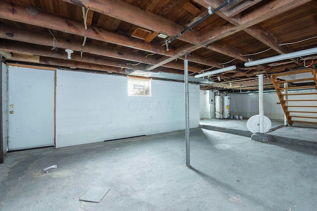 1936 Case Rd, Columbus, OH 43224 - basement featuring gas water heater and concrete block wall
