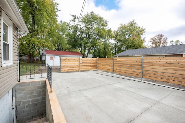 1936 Case Rd, Columbus, OH 43224 - fenced backyard with a patio and an outdoor structure