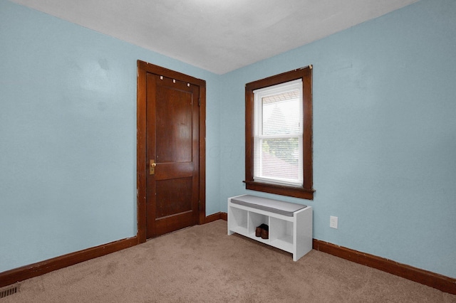 1936 Case Rd, Columbus, OH 43224 - unfurnished room featuring baseboards and light colored carpet