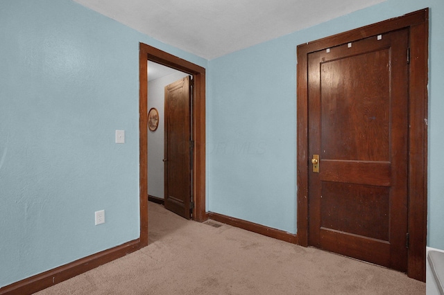 1936 Case Rd, Columbus, OH 43224 - unfurnished bedroom featuring carpet flooring and baseboards