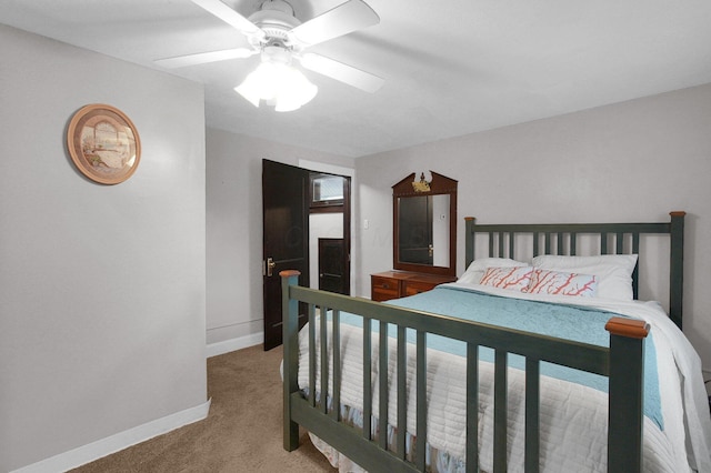 1936 Case Rd, Columbus, OH 43224 - bedroom with light colored carpet, baseboards, and ceiling fan