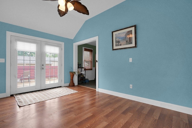 1936 Case Rd, Columbus, OH 43224 - spare room with french doors, vaulted ceiling, a ceiling fan, wood finished floors, and baseboards