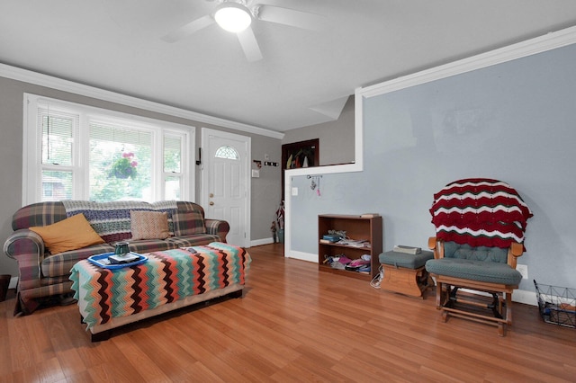 1936 Case Rd, Columbus, OH 43224 - living area featuring ornamental molding, wood finished floors, ceiling fan, and baseboards