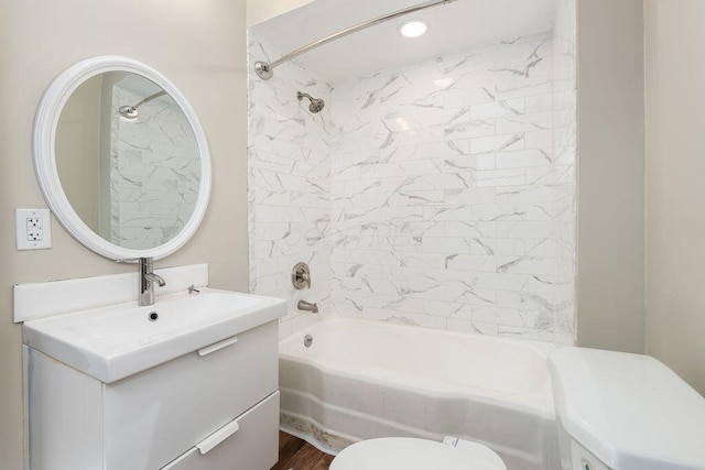 2165 Amherst Ave, Columbus, OH 43223 - bathroom with toilet, vanity, and shower / bathtub combination