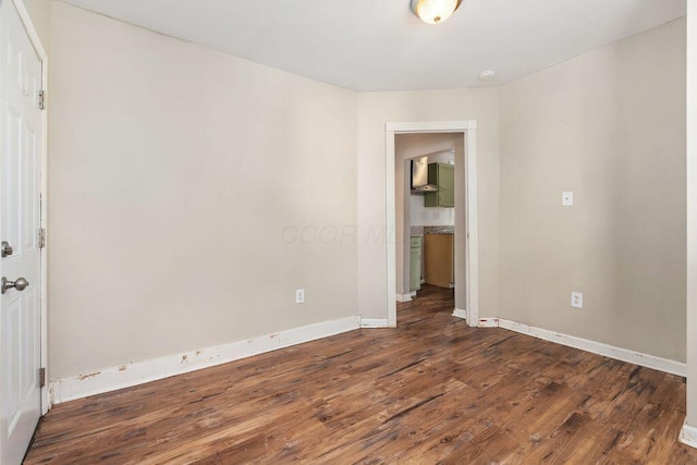 2165 Amherst Ave, Columbus, OH 43223 - empty room with dark wood-type flooring and baseboards