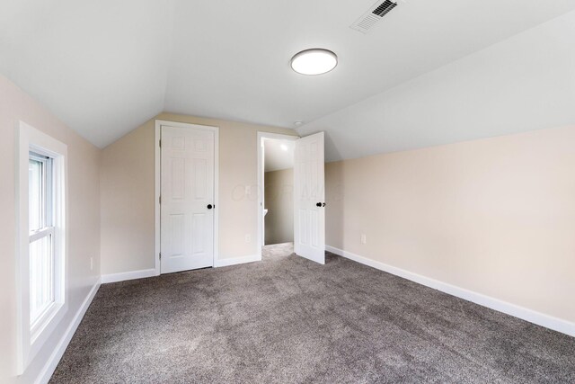 1805 Meriline Ave, Obetz, OH 43207 - additional living space featuring carpet floors, lofted ceiling, and baseboards