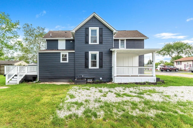 1805 Meriline Ave, Obetz, OH 43207 - back of house featuring a yard, covered porch, and a shingled roof
