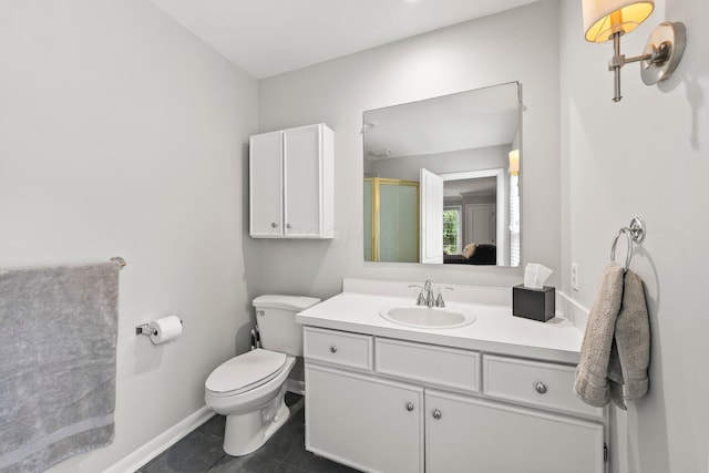 195 S Gould Rd, Columbus, OH 43209 - full bath featuring vanity, tile patterned floors, a shower stall, toilet, and baseboards
