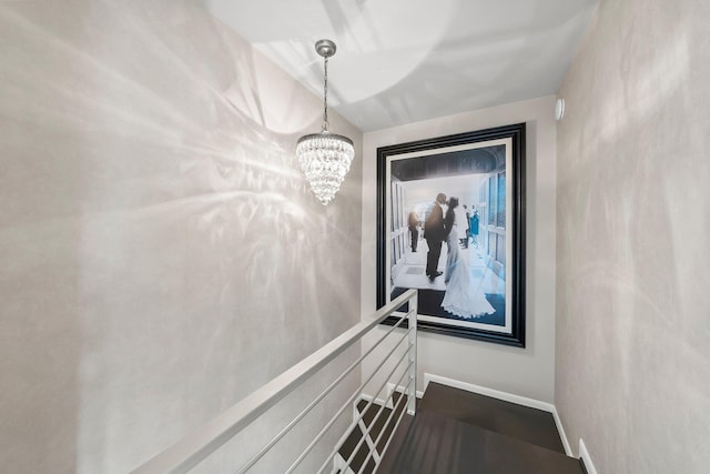 195 S Gould Rd, Columbus, OH 43209 - stairway featuring a chandelier and baseboards