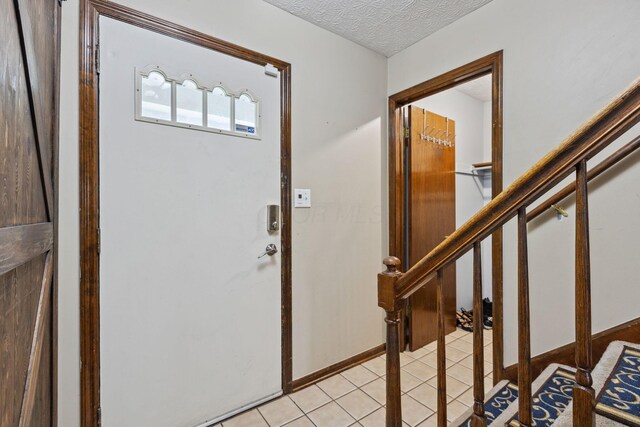 6897 Roundelay Rd N, Reynoldsburg, OH 43068 - foyer entrance with light tile patterned floors