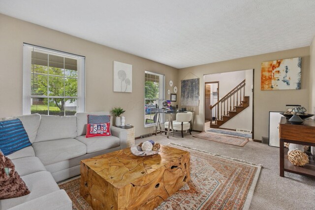 6897 Roundelay Rd N, Reynoldsburg, OH 43068 - living room with stairs and carpet floors