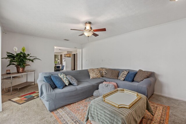 6897 Roundelay Rd N, Reynoldsburg, OH 43068 - carpeted living area with a ceiling fan