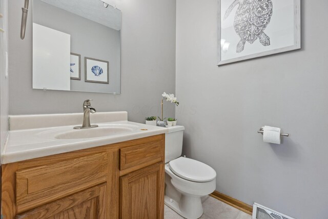 6897 Roundelay Rd N, Reynoldsburg, OH 43068 - half bathroom with toilet and vanity