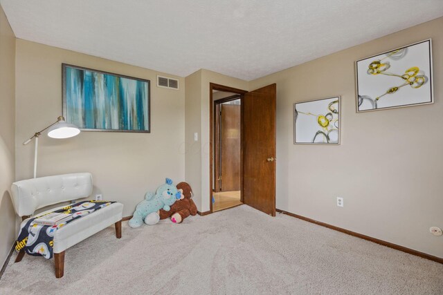 6897 Roundelay Rd N, Reynoldsburg, OH 43068 - sitting room featuring carpet floors and baseboards