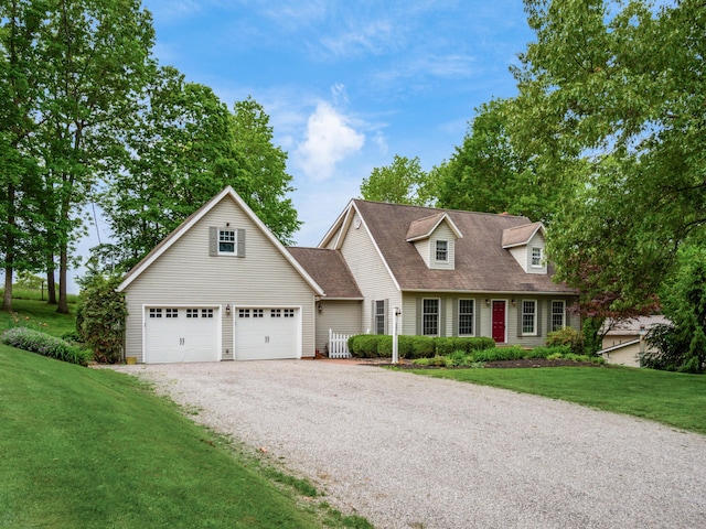 2870 Tarkman Dr, Nashport, OH 43830 - new england style home featuring driveway, a front lawn, and a shingled roof